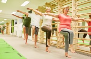 Group of seniors working on their one-legged balance