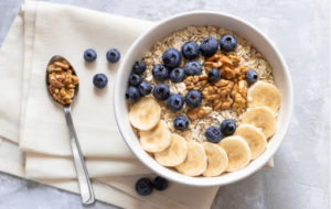 A healthy bowl of oatmeal with fruit, perfect for breakfast