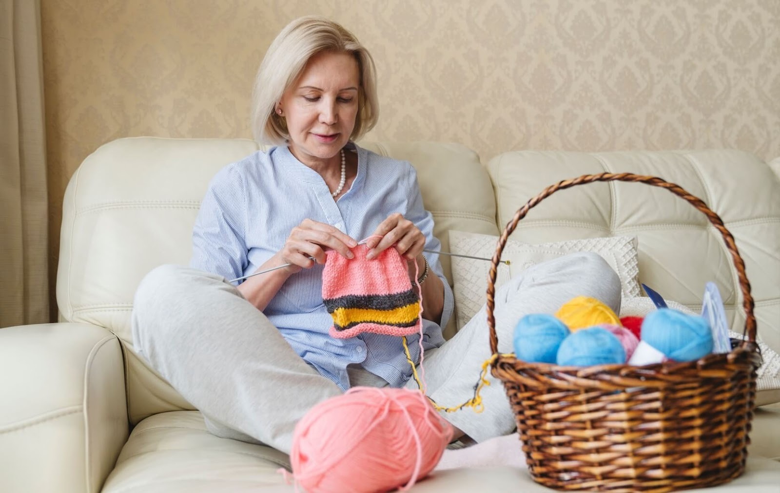 A senior spends the afternoon crocheting.